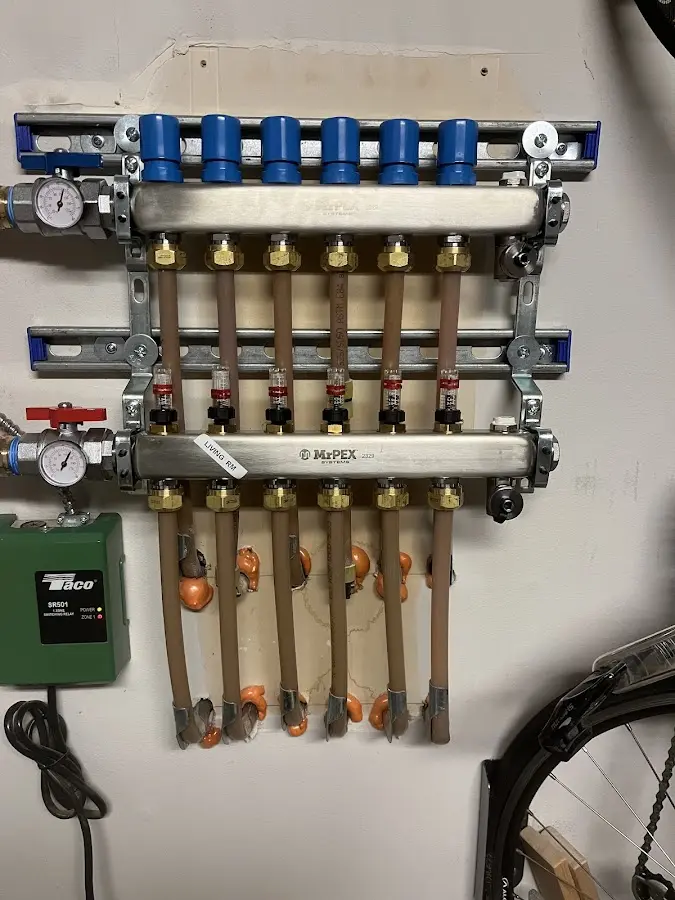 Plumber performing Gas Leak Detection at a residential property in Warsaw